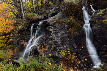 Smugglers Notch roadside mountain stream waterfall from Madonna peak Sterling Range Vermont in Fall