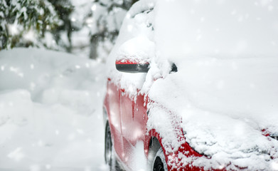 Winter calamity concept. Cars covered with snow detail.