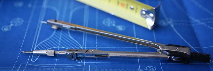 Stethoscope lying on female therapeutist doctor chest