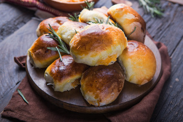 Ready-made baked pies with cabbage.  Traditional russian cuisine. Dinner. treats family traditions.
