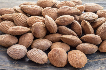 Almond. Almond nuts On A Wooden Background Macro.