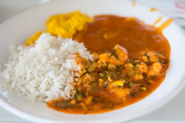 Plate with traditional brazilian seafood shrimp moqueca