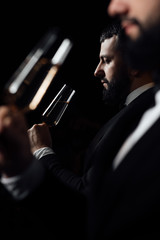 man with glass of wine