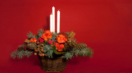 New Year, Christmas decoration, candles and flowers, a place for advertising