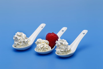 Whipped cream, with strawberries.