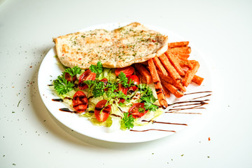 Chicken dish on a restaurant table