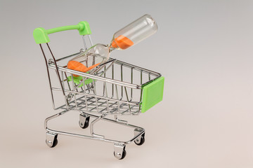 shopping cart with the hourglass, the concept of a for a limited and valuable time, money can not...