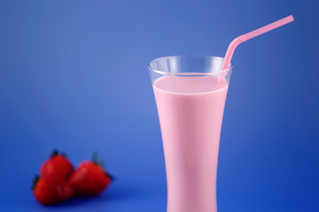 Strawberry milkshake, sweet drink made with cow's milk.
