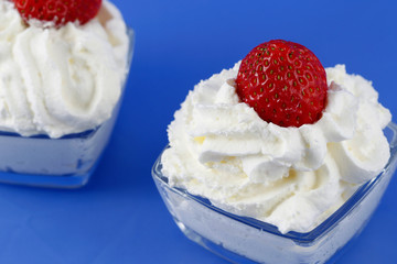 Strawberries with cream, very sweet and creamy dessert.