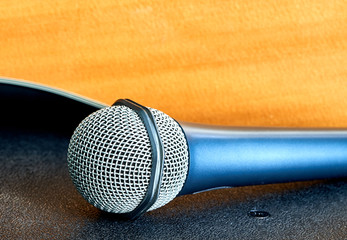 Obraz premium microphone and guitar are on the table