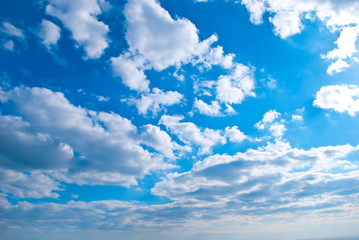 Blue sky with clouds on a sunny day