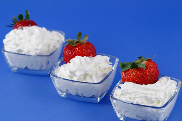 Strawberries with cream, very sweet and creamy dessert.