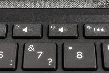 sign without sound silence on the keyboard keys of a laptop or personal computer, the concept of...
