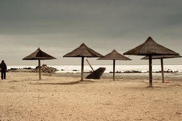 Straw umbrellas in the winter
