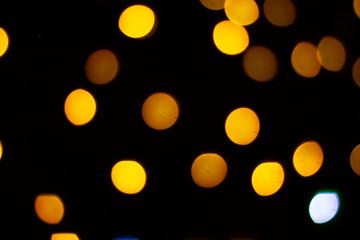 Photo of bokeh lights on black background. Perfect for overlay.