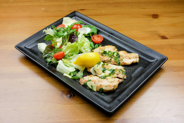 Chicken dish on a restaurant table