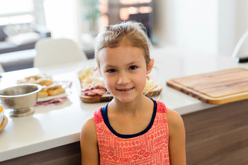 Smiling Girl in Kitchen