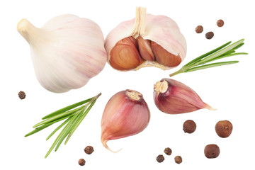 garlic with rosemary, peppercorns and allspice isolated on white background. top view
