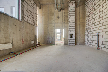 Layout of building materials bricks. unfinished, incomplete, pending. Monolithic brick basement...
