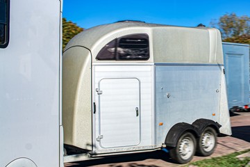 horse vehicle .  Carriage for horses . Auto trailer for transportation of horses . transportation livestock . Horse transportation van , equestrian sport