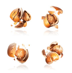 Set of crushed hazelnuts close-up isolated on a white background