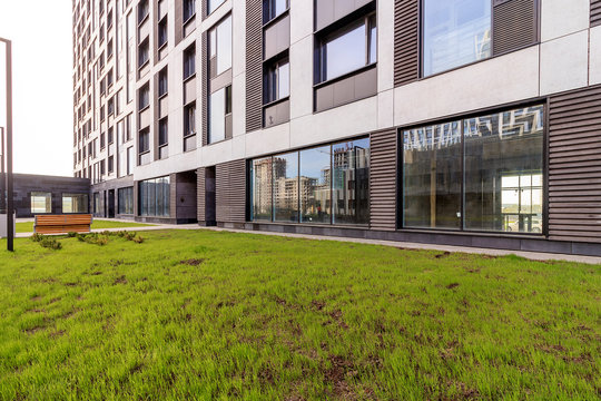 Panoramic window of modern residential building view outside. Insulating glass (glazing, pane). Storm windows. Ground floor apartment. first for shops, offices. commercial premises. Rainscreen. Door