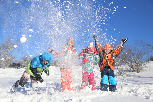 kids playing in snow