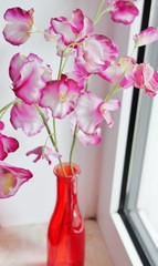 Künstliche Orcihdee in der Vase