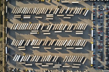 Logistics center with trucks and trailers for cargo dispatching