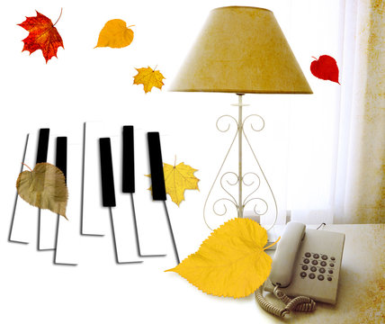Retro white lamp and retro telephone are on the table opposite the bright daylight from the window with a white open curtain. Piano keys. Colorful leaves fall. Autumn melody. Love Dream 