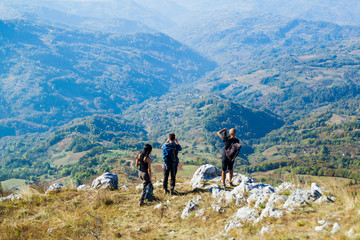 Hikers on the peaks taking photo of beautiful natural landscape view in Serbia