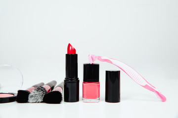 View on set of woman make up cosmetics on white background. Beauty and fashion concept. On table...