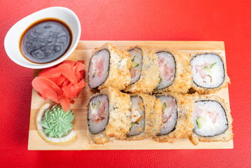 Baked roll breaded. with various fillings. With ginger and wasabi.