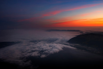 Fototapeta na wymiar fog in the valley during sunrise. Photo taken from mount Rigi
