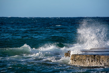 Waves hitting rock platform in Malta © anovva