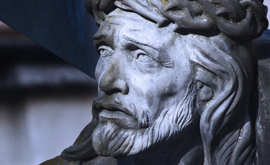 Close up ancient statue of Jesus Christ