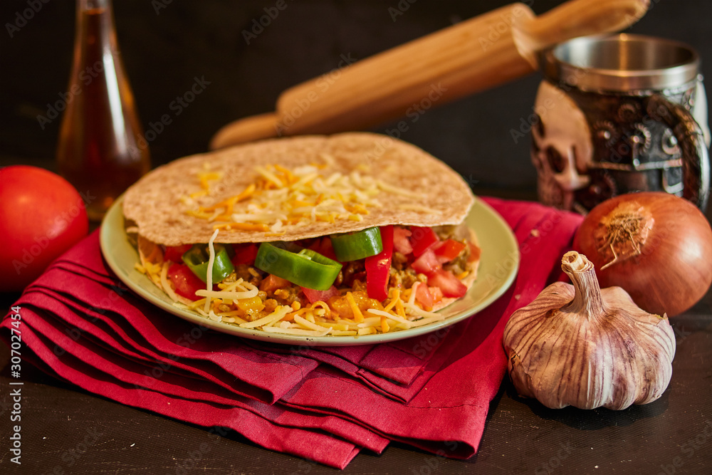 Wall mural quesadilla with tomato, pepper and garlic