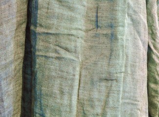 Detailed view on fabrics and textile surfaces and texture in different colors
