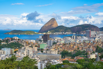 Beautiful view of Sugar Loaf Mountain and Favela Santo Amaro from Ruins Park (Parque das Ruinas) viewpoint - Rio de Janeiro, Brazil