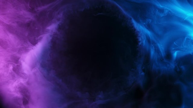 Slow motion of coloured smoke effect with revealing circle. Filmed on high speed cinema camera.