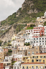 Fototapeta na wymiar architecture in the old beautiful italian coastal town of positano where all the building are built onto going up the cliff face.