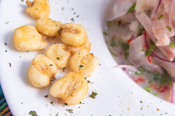 Garlic and fish ceviche with onion