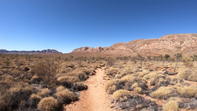 Ormiston Pound circular walk in West MacDonnell Ranges National Park and has views of Mount Sonder and Gosses Bluff crater. Northern Territory, Australian Outback, the halfway point in Larapinta Trail