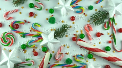 Christmas Eve holiday mood close up background. Winter Merry days  traditional ornament of candy...