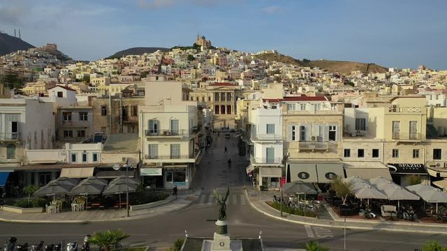 Aerial drone video of iconic landmark neoclassical city hall building in main town of Syros or Siros island - Miaouli square, Ermoupolis, Cyclades, Greece