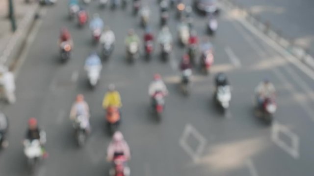 Blurred footage of traffic transport in Ho Chi Minh, Vietnam. Royalty high-quality free stock footage of slow moving traffic with lots of motorbike, car... transport on the road in Ho Chi Minh city