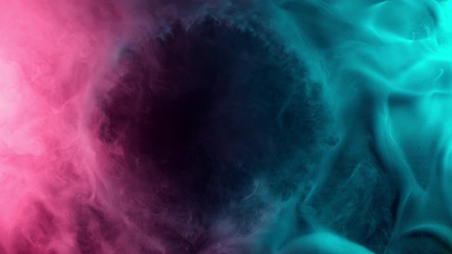 Slow motion of coloured smoke effect with revealing circle. Filmed on high speed cinema camera.