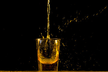 Pouring a shot of whiskey