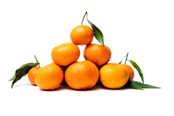 clementine tangerines with leafls on a white background