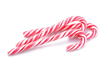 Candy canes on white background